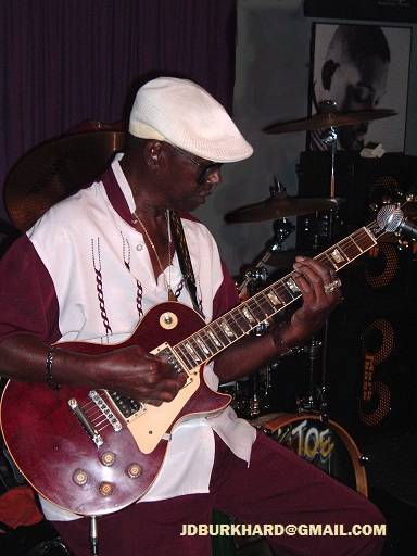 Texas Johnny Brown playing guitar
